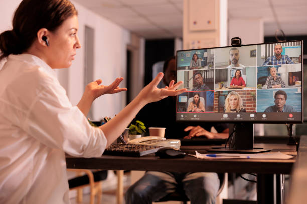 istock Executive manager discussing startup strategy with employees on videocall 1447087018