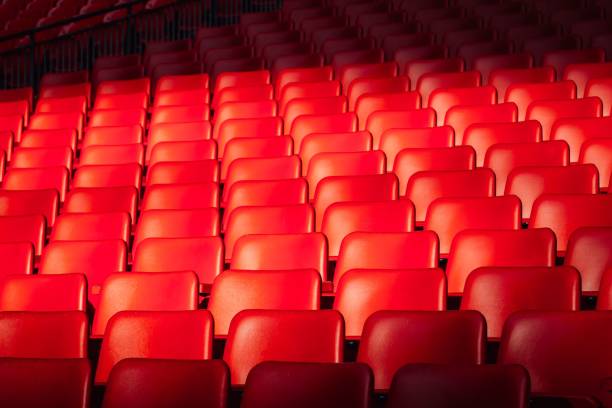 istock Front view of an empty and red auditorium seats 1447088749