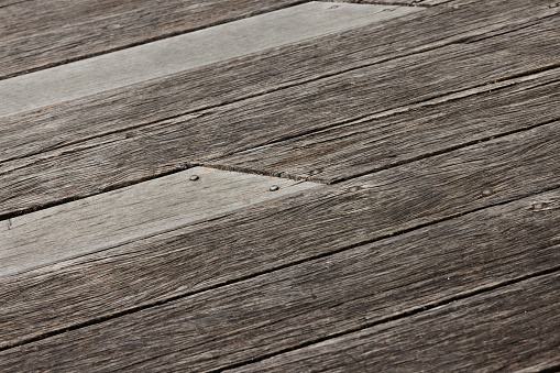 Looking along part of a timber deck.
