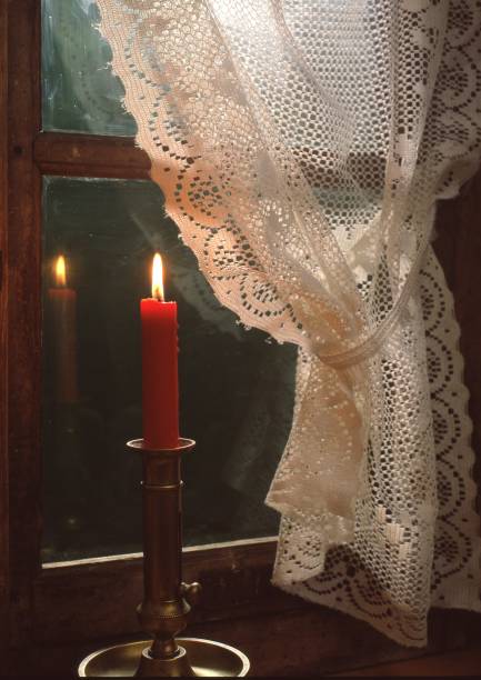 istock Vertical shot of a burning candle 1447091090