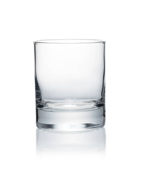 istock Whiskey glasses placed on white background 1447092393