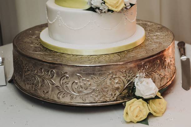istock Closeup of a festive wedding cake on a table 1447093004