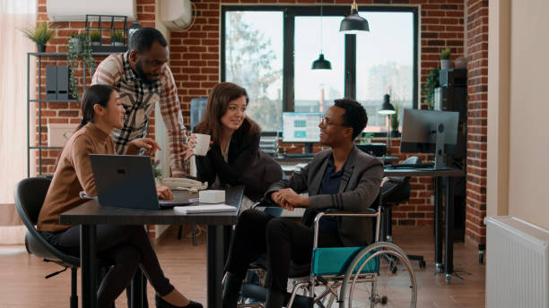 istock Multiethnic group of people brainstorming ideas in office 1447093024
