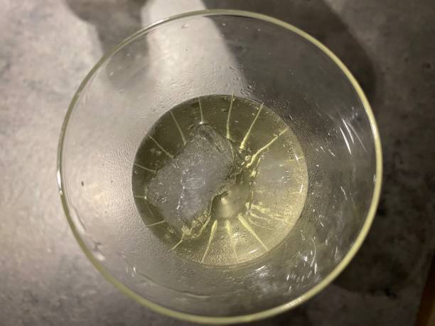 istock Champagne glass with ice cubes seen from above 1447093793
