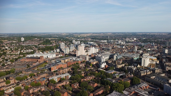An aerial shot of the city streets with residential buildings and offices, Nottingham, England