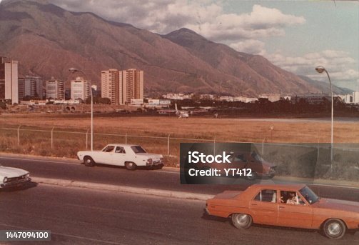 istock old cars on road 1970s 1447094100