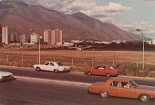 old cars on road 1970s