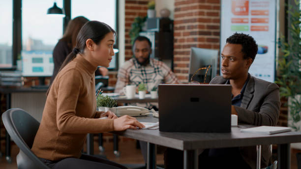istock Man and woman doing teamwork to create marketing analysis 1447094783