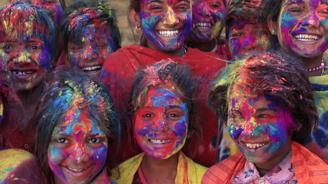 Colors of India - Indian children playing colorful powders during holi, India