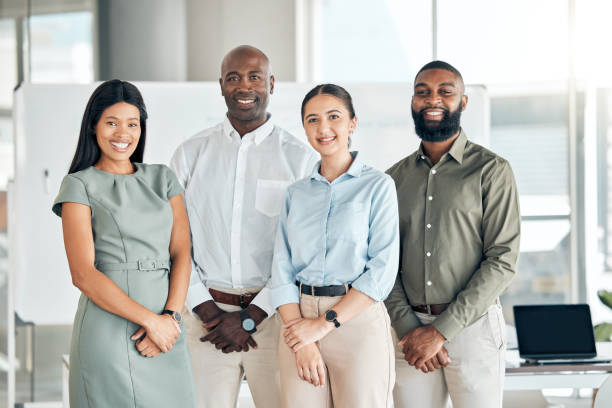 istock Diversity, global office and teamwork with motivation, vision and innovation for business, company or success. Portrait of smile, happy and collaboration men, women and corporate workers for about us 1447098300