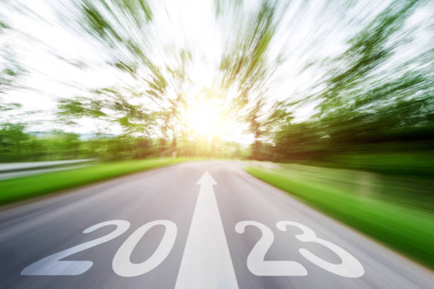 istock Empty asphalt road with Number 2023 and arrow sign, blurred motion 1447104204