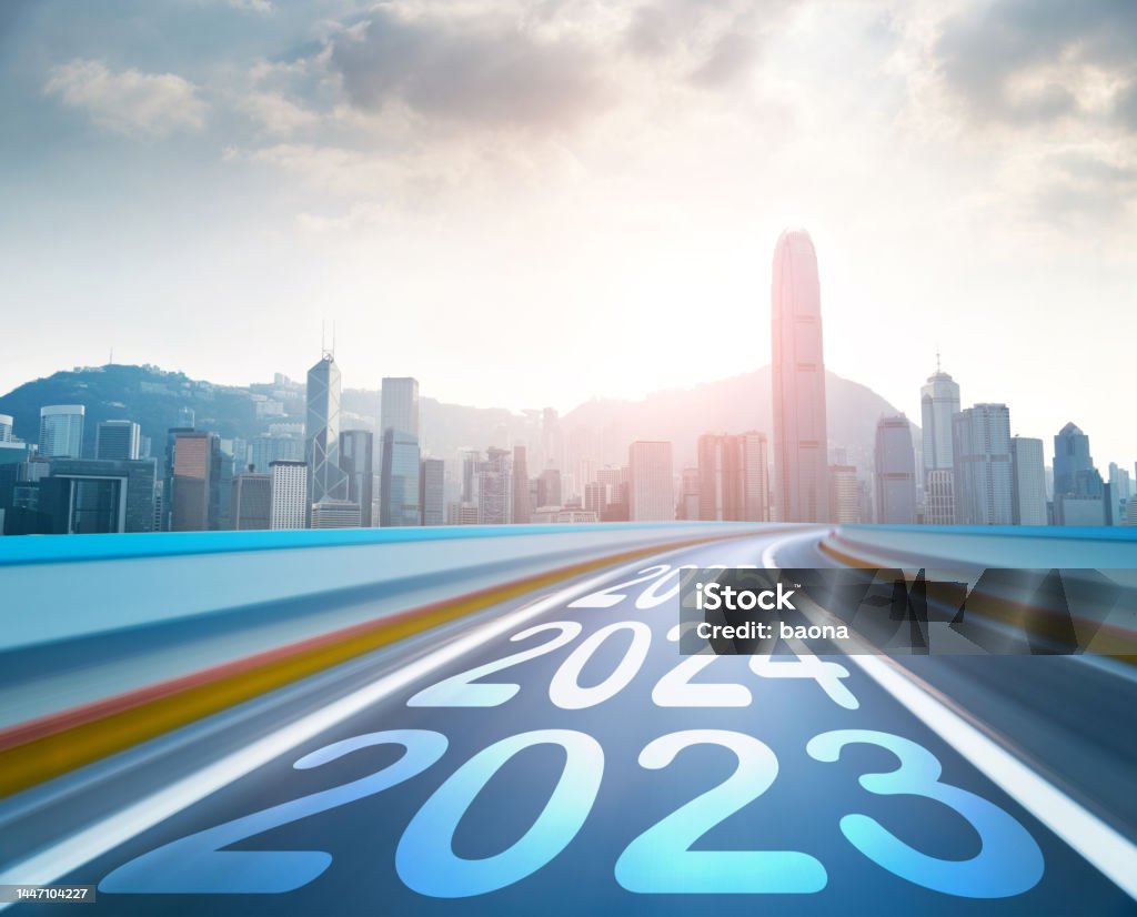 Hong Kong skyline and blurred motion road with number 2023 to 2025 2023 Stock Photo