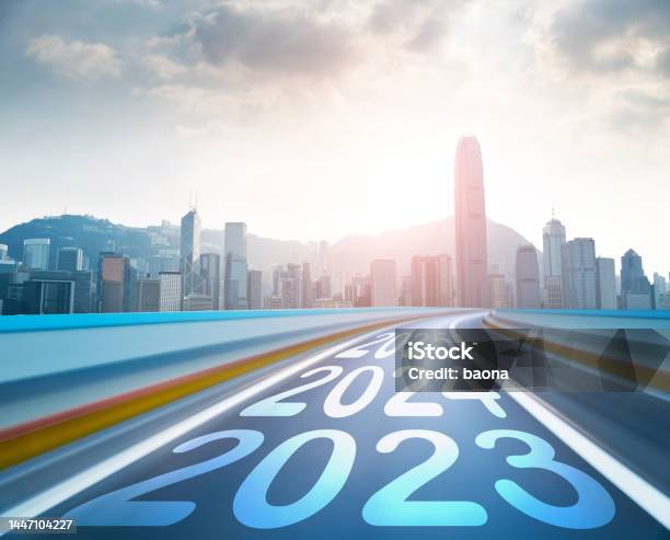 Hong Kong Skyline And Blurred Motion Road With Number 2023 To 2025 Stock Photo - Download Image Now