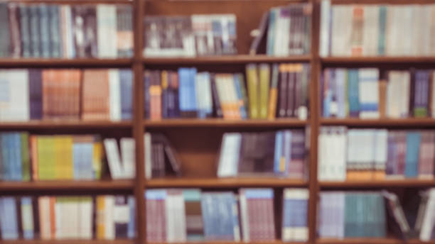istock blurred, Many books on shelves for sales. 1447105492