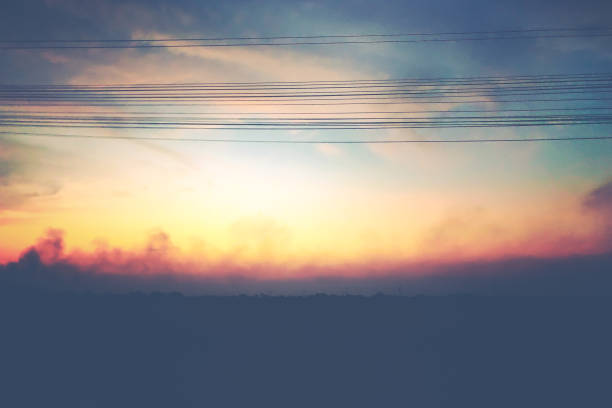 istock Pollution smog countryside landscape smoke blue sky with clouds 1447105493