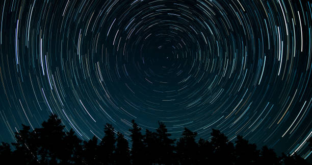 istock Star trails in the night sky 1447105609