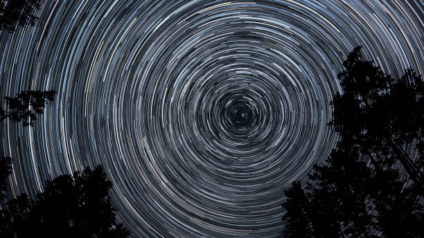 istock Star trails in the night sky 1447105663