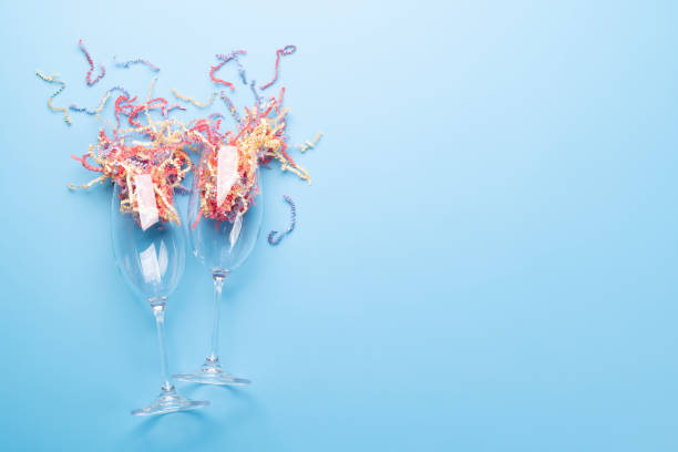 istock Holiday day card with champagne glasses 1447109807