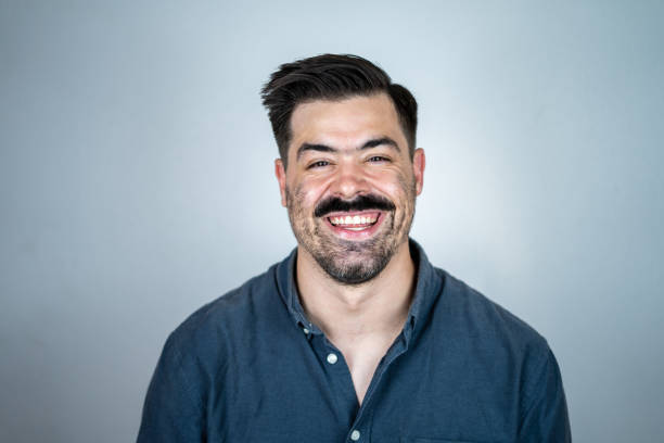 istock Handsome Young Male Studio Headshot on White Background 1447119245