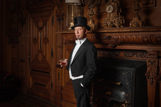 istock A handsome elegant 1920s style gentleman in a luxury stately home 1447121352