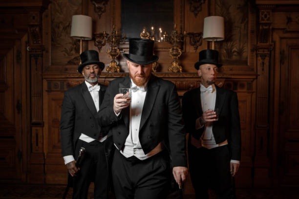 istock Three handsome 1920s style gentlemen in a luxury brown bar 1447121442