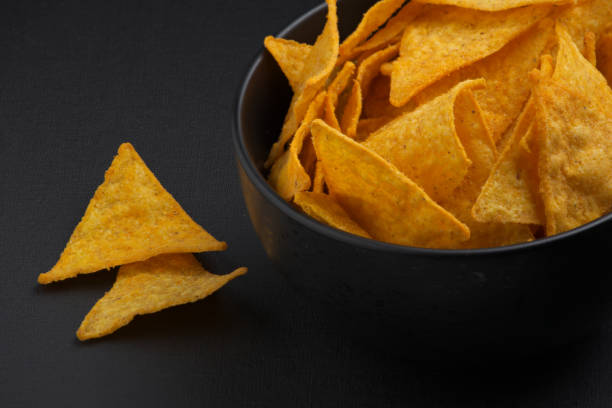 istock Tortilla chips in a black clay bowl 1447122833