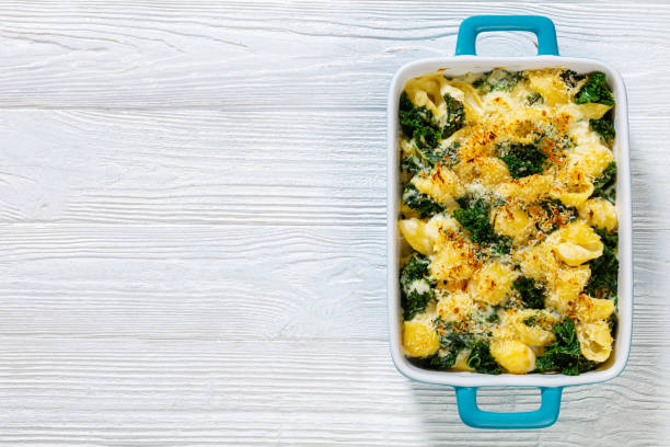 istock cheesy baked pasta with green leafy kale 1447123898