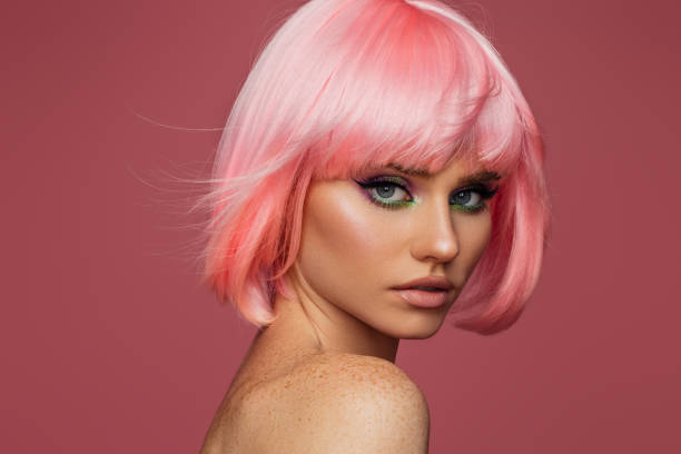 istock Beautiful woman with pink hairstyle 1447125607