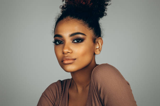istock Beautiful afro woman with perfect make-up 1447126086