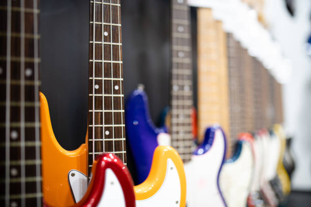 istock Many electric basses lined up 1447126112
