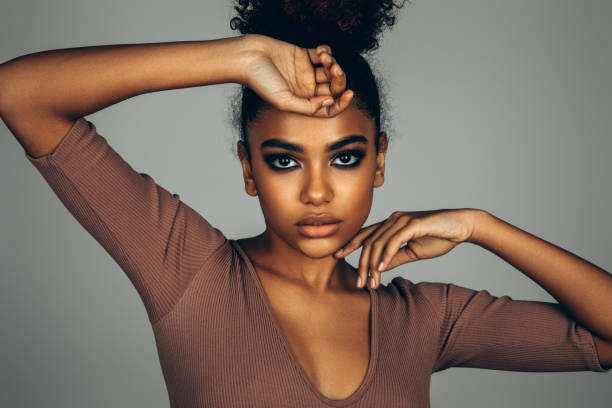 istock Beautiful afro woman with perfect make-up 1447126123