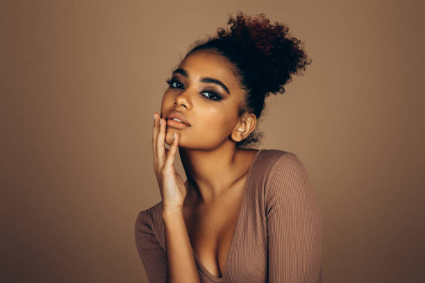 istock Beautiful afro woman with perfect make-up 1447126168