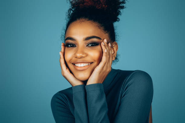 istock Beautiful afro woman with perfect make-up 1447126233