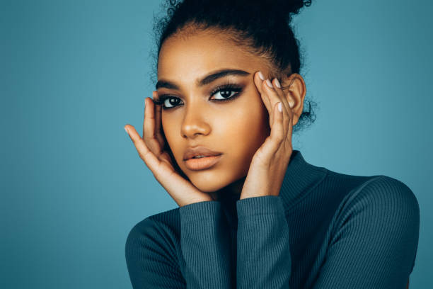 istock Beautiful afro woman with perfect make-up 1447126289