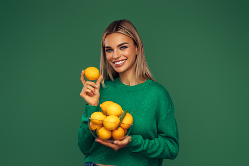 Girl with  lemons