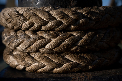 Partial light and shadow of the cable on the ship