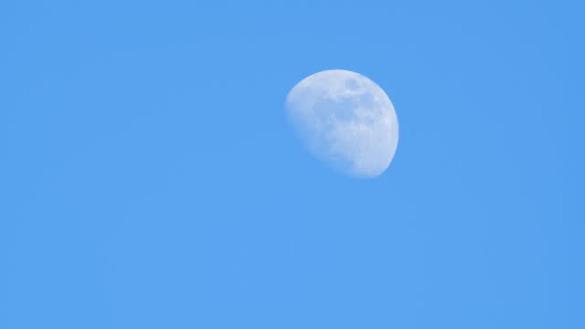Half moon on day light