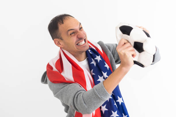 istock Fan Sport Player celebrating on background 1447128823