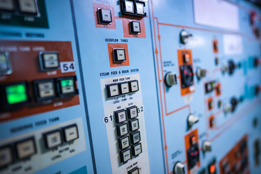 Image of a control panel with many buttons.