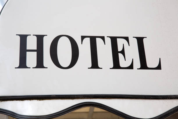 istock Hotel Sign on White Background 1447131626