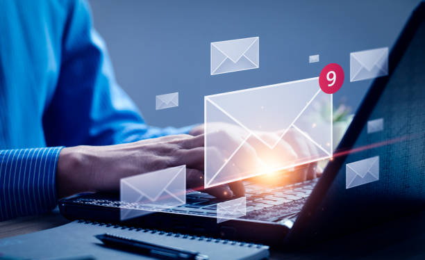 istock businessman checking message box on laptop and send email. email marketing concept, digital newsletter to customers. Online marketing strategies that reach target customers. 1447133124