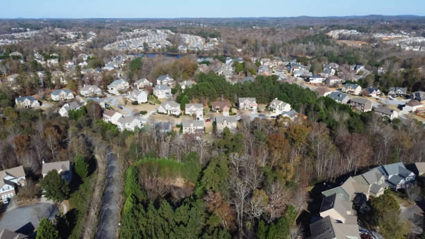 istock Master-planned community and census-designated residential houses subdivision expanding to horizontal line near Atlanta, Georgia, US 1447133406