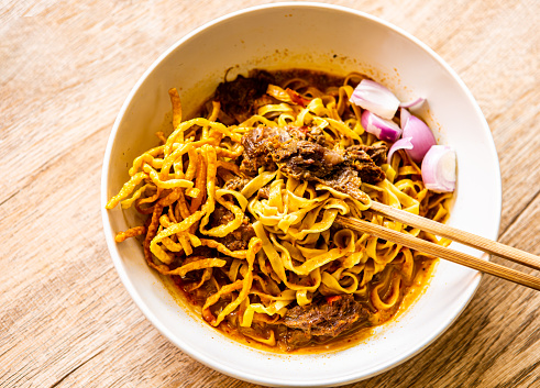Northern Thai Curry Noodles with Beef or  Khao Soi, Thai famous food.
