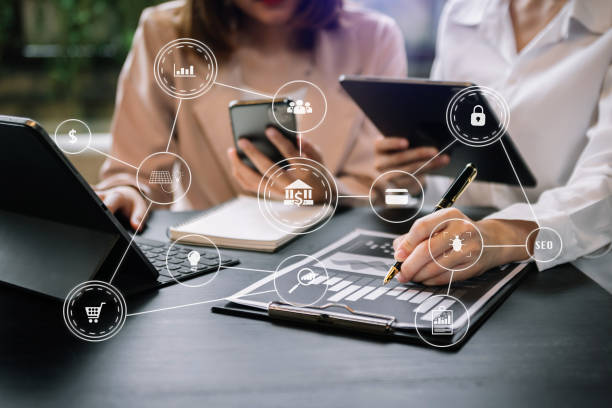istock Working team meeting concept, business using laptop and smart phone and digital tablet computer with digital marketing media  in virtual icon network diagram office in morning light 1447139631