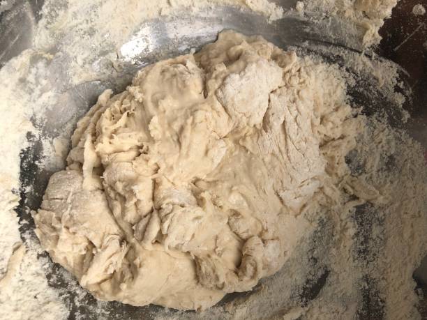 istock Closed view of the proccess of doing dough 1447140366