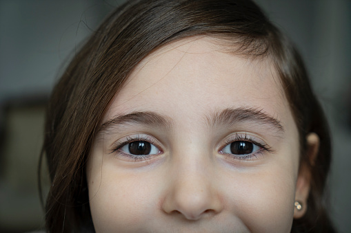 7 year old child with beautiful brown eye color