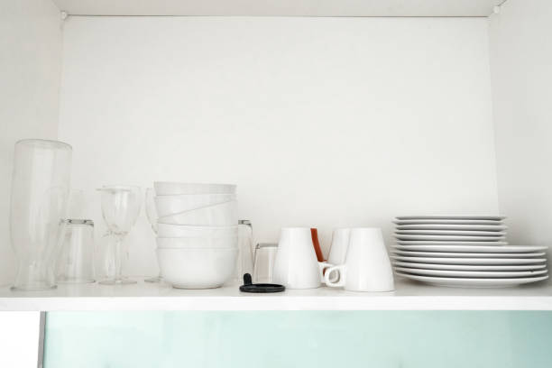 istock A shelf with dishes in the kitchen cupboard 1447144205