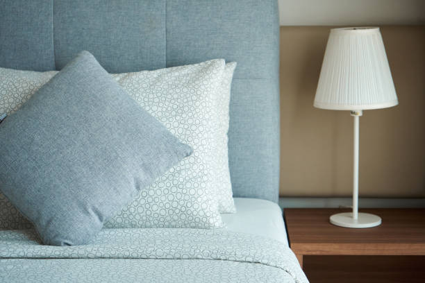 istock Apartment interior hotel with two single beds and bedside lamps 1447145335