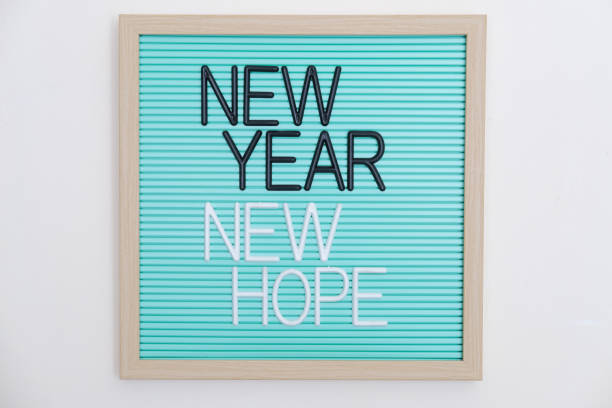 Wooden board with New Year New Hope text Wooden board with New Year New Hope text latar belakang stock pictures, royalty-free photos & images