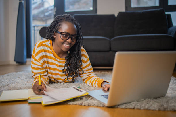 istock Young woman working from home 1447153217